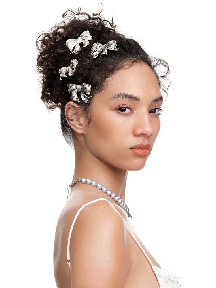 YVMIN X SHUSHUTONG / Embossed Floral Bow Hair Clip