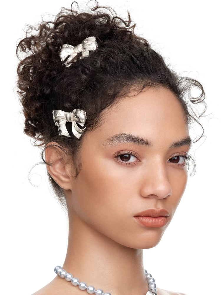 YVMIN X SHUSHUTONG / Embossed Floral Bow Hair Clip